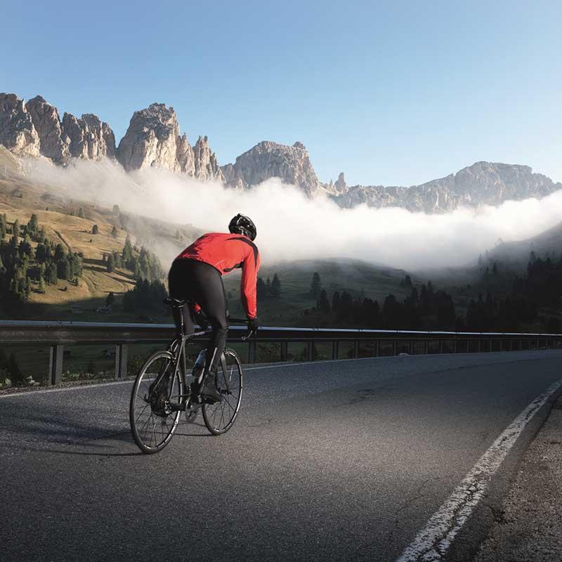 Person riding a bike on a road